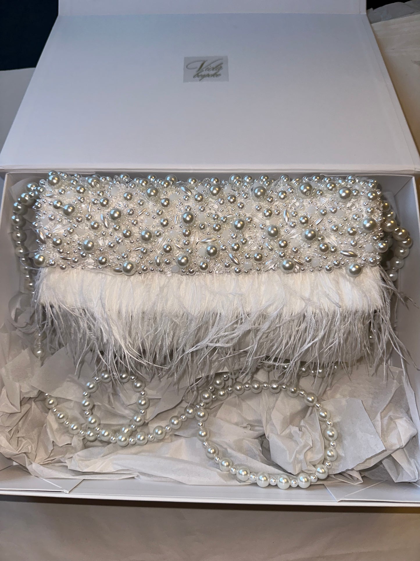 Ivory Hand beaded pearl bag