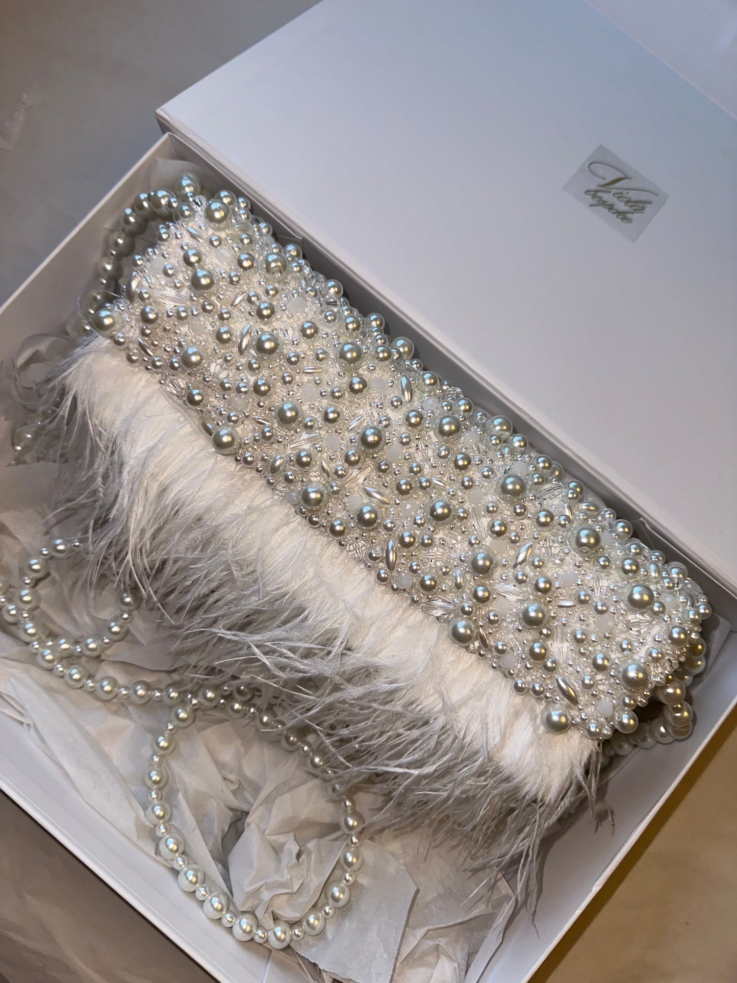 Ivory Hand beaded pearl bag